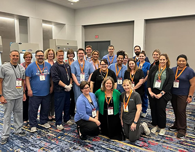 A group photo of pharmacists at the 2025 ASHP Pharmacy Future meeting