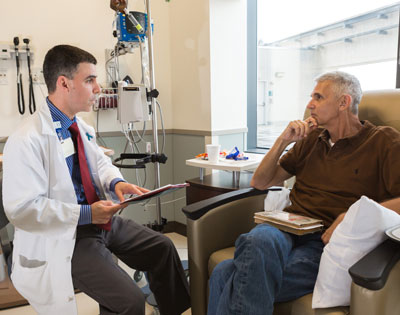 Pharmacist counseling a patient