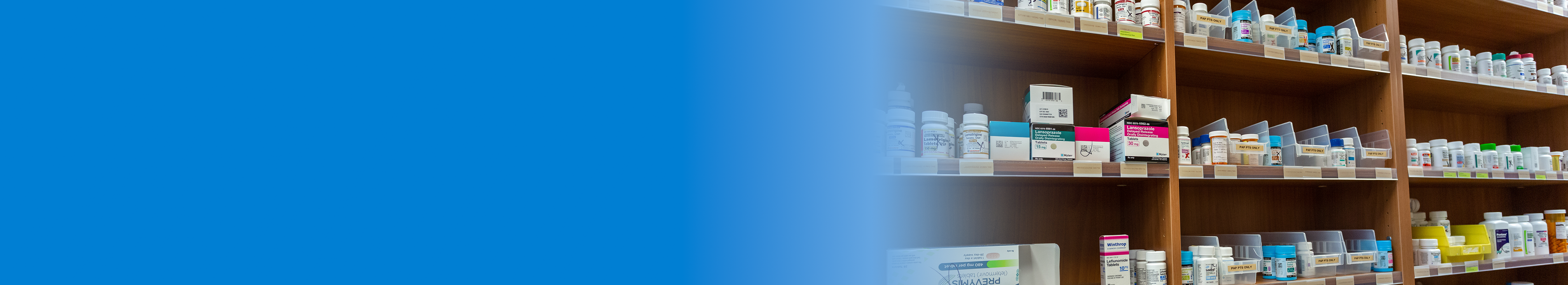 Shelves with medication bottles