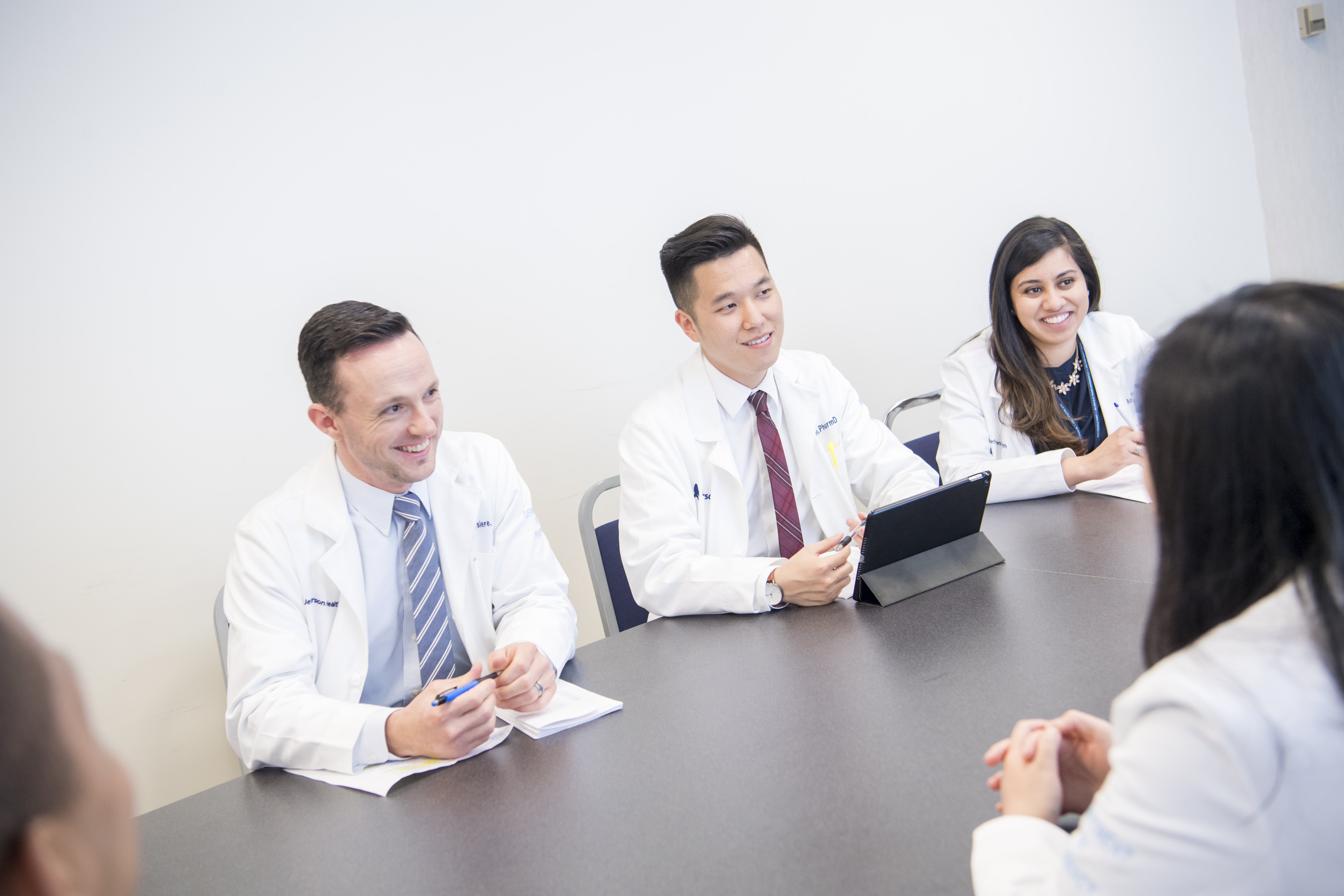 pharmacists in a board room